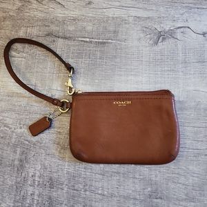 Coach wristlet. Leather. Well used.